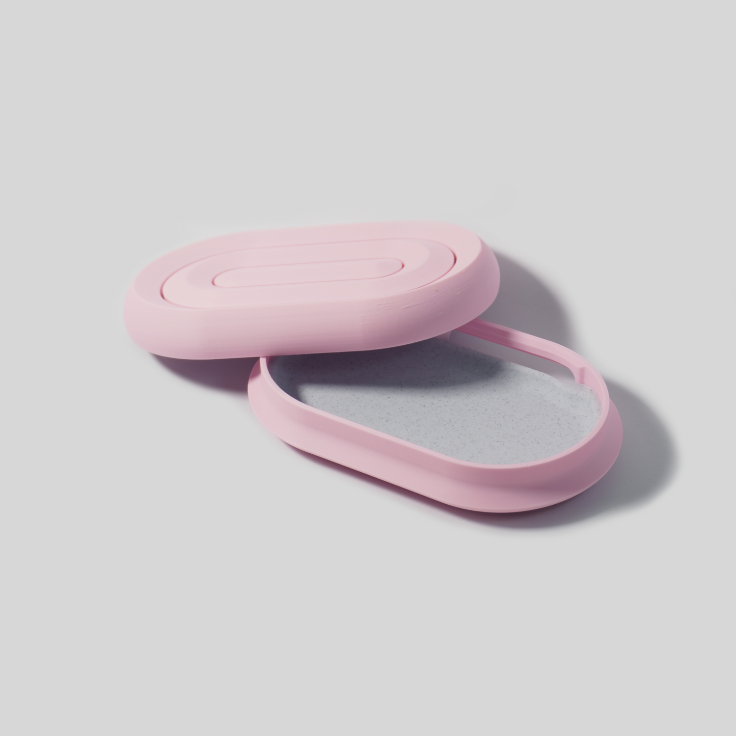 Pink open soap holder on a light gray background, hamburg, plant-based