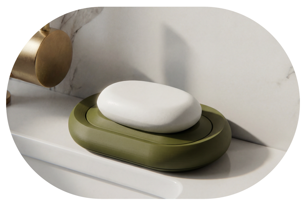 Soap holder with a bar of soap on a marble surface