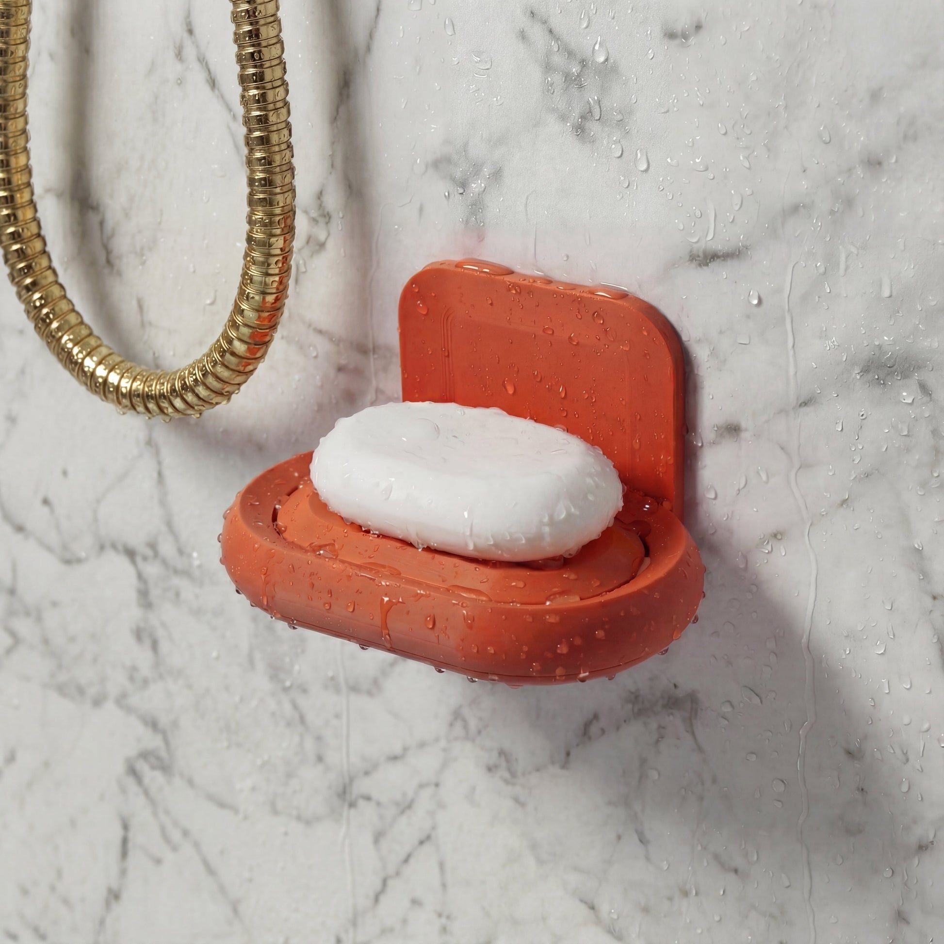 Terracotta soap holder with natural soap mounted in shower