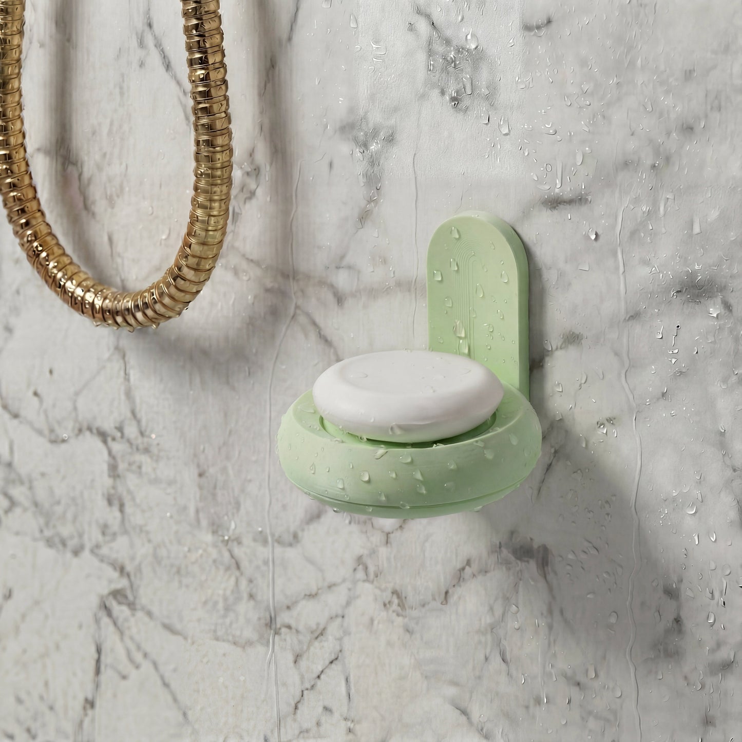 mint Green soap holder with a bar of soap on a marble surface in the shower
