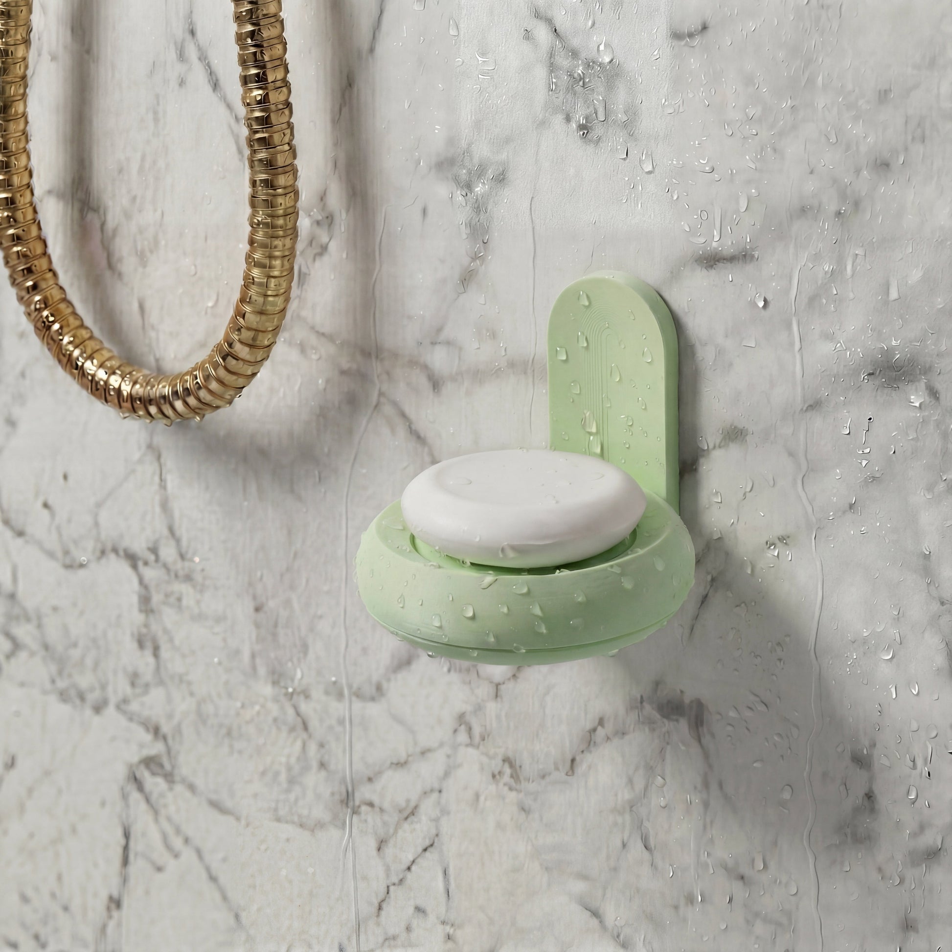 mint Green soap holder with a bar of soap on a marble surface in the shower