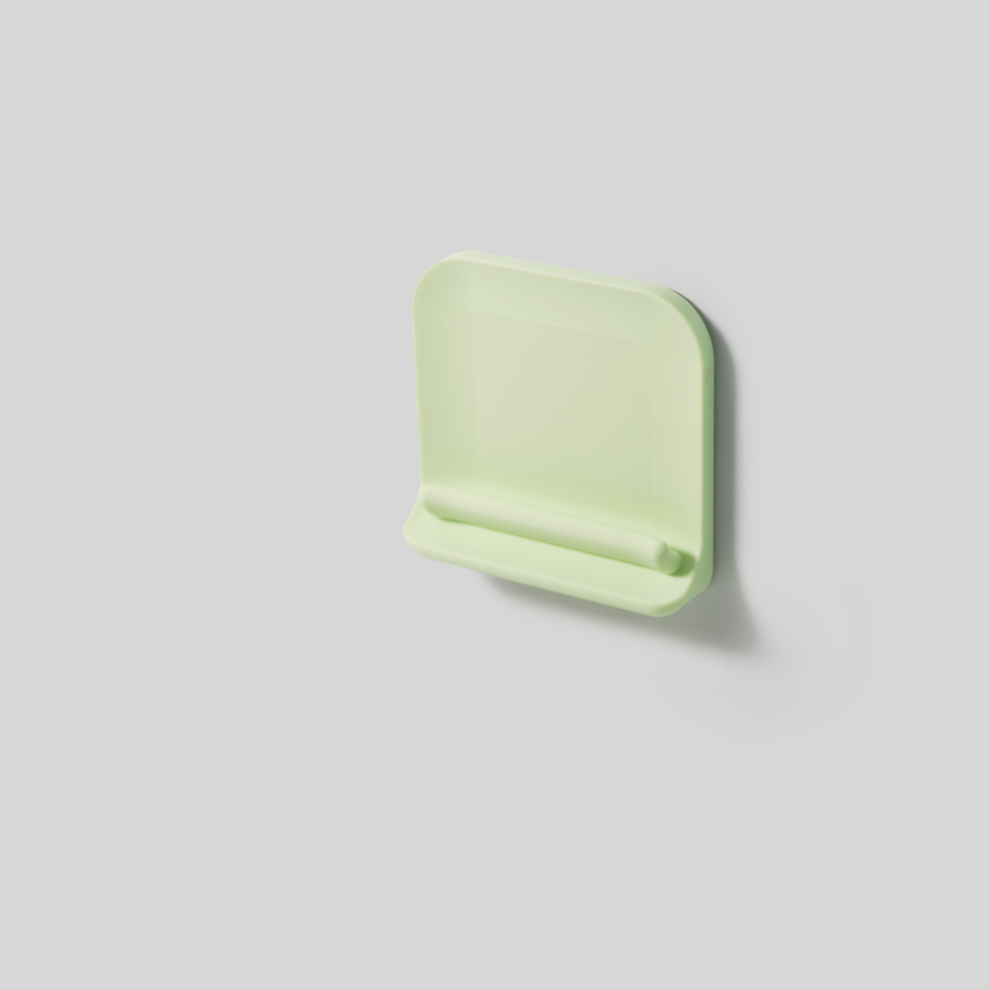 Light green wall mount on a light gray background plant-based pla